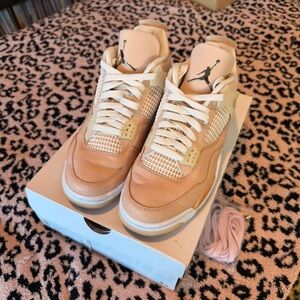 Jordan 4 Retro in Shimmer and Metallic Silver